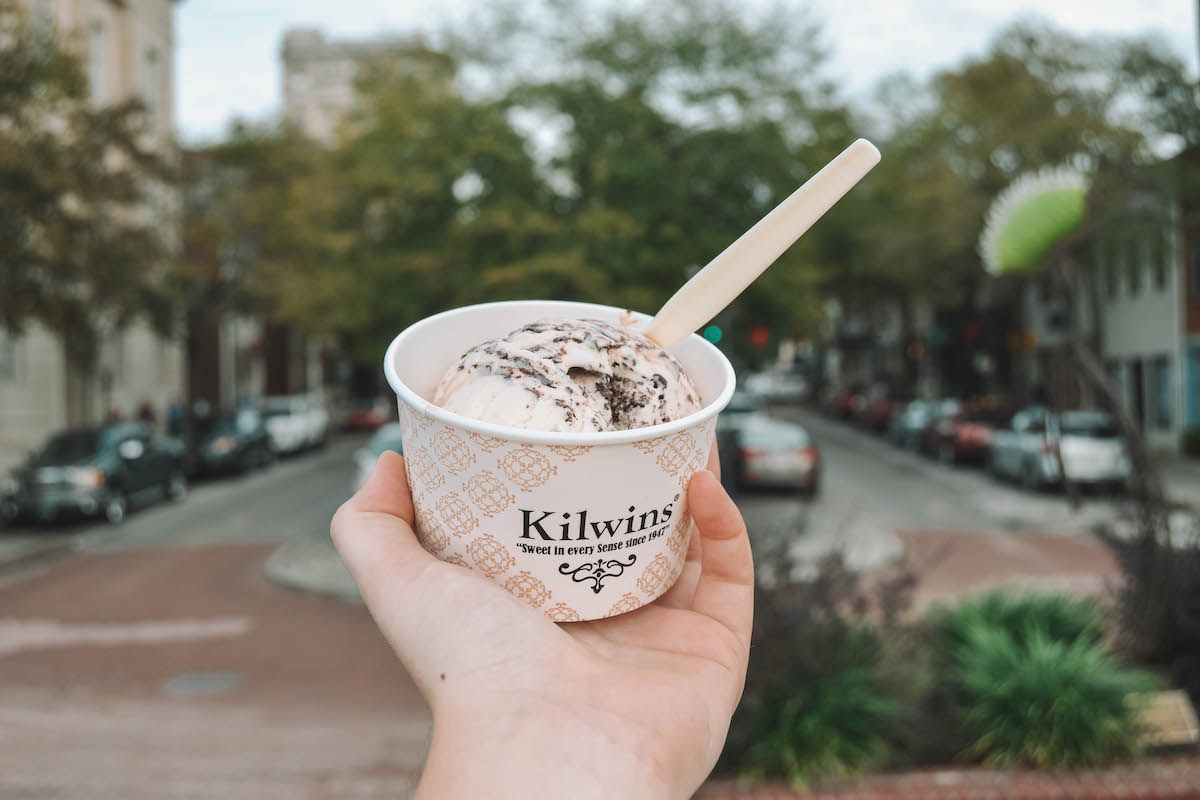 A dish of Kilwin's ice cream being held aloft. 