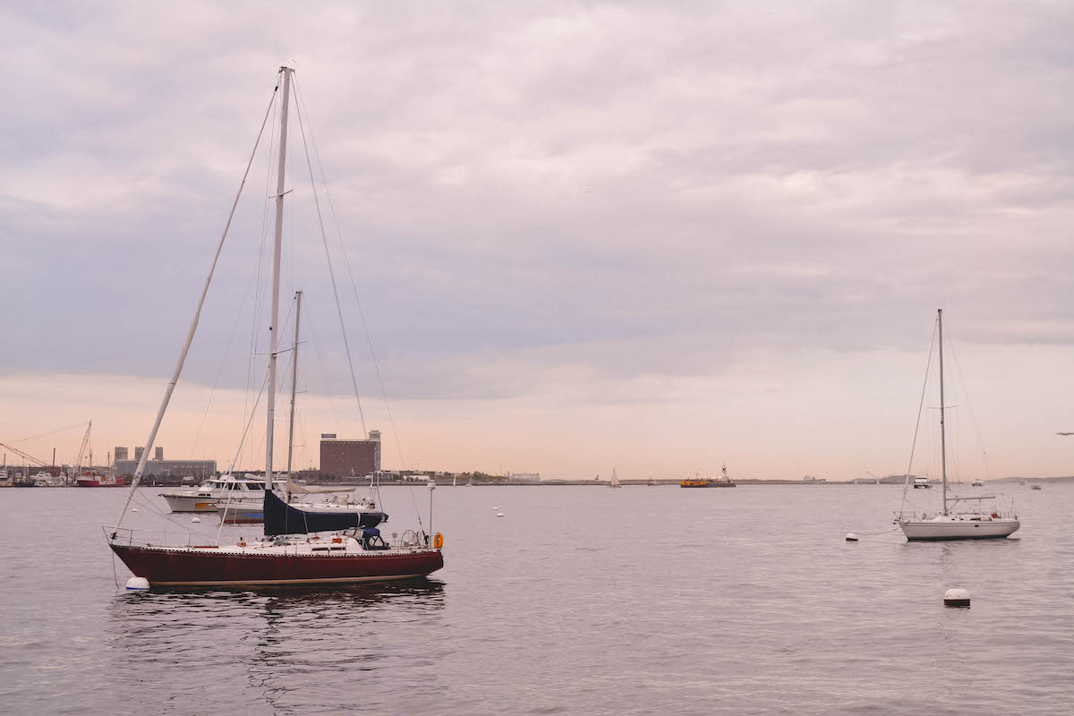 Boats at sunset in Boston Harbor. 