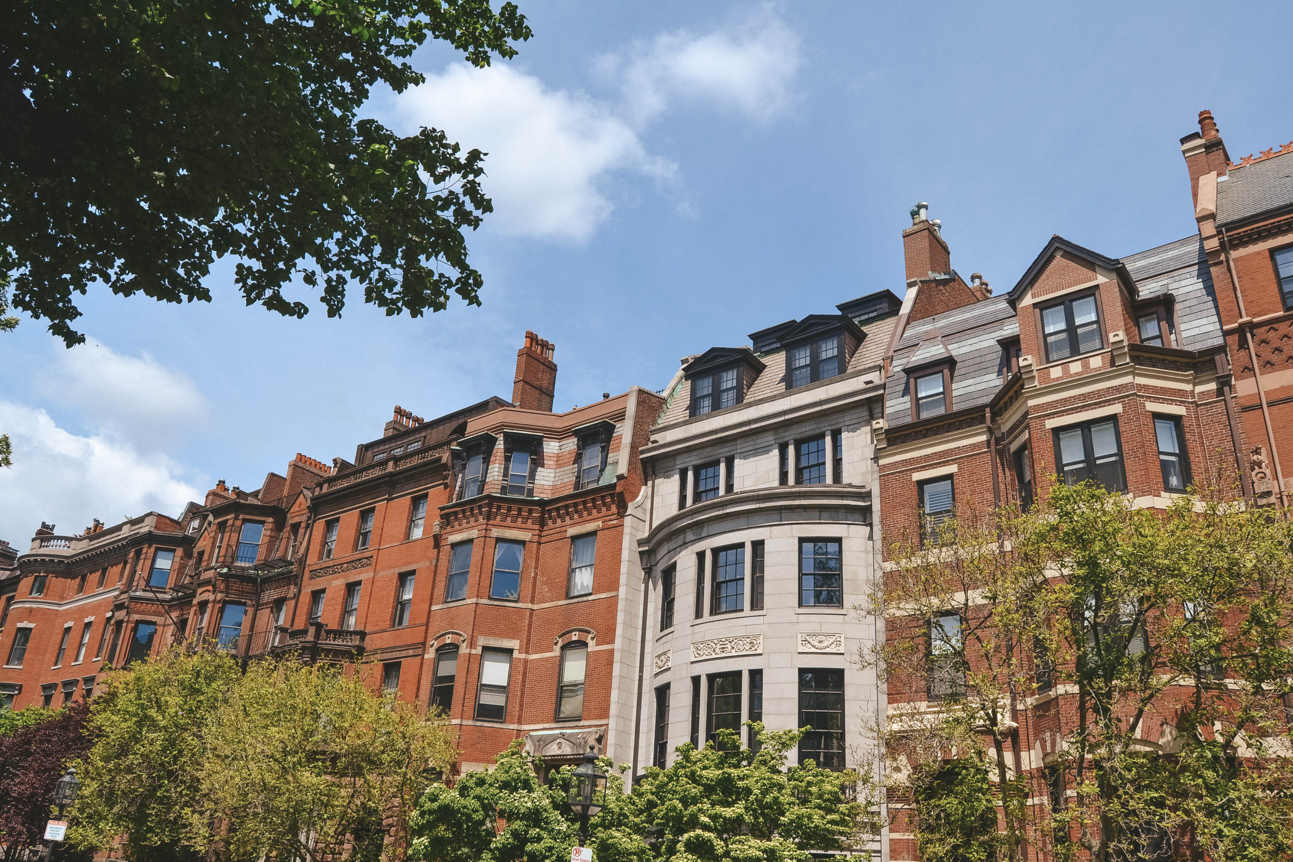 A line of roofs along Commonwealth Avenue in Boston. 