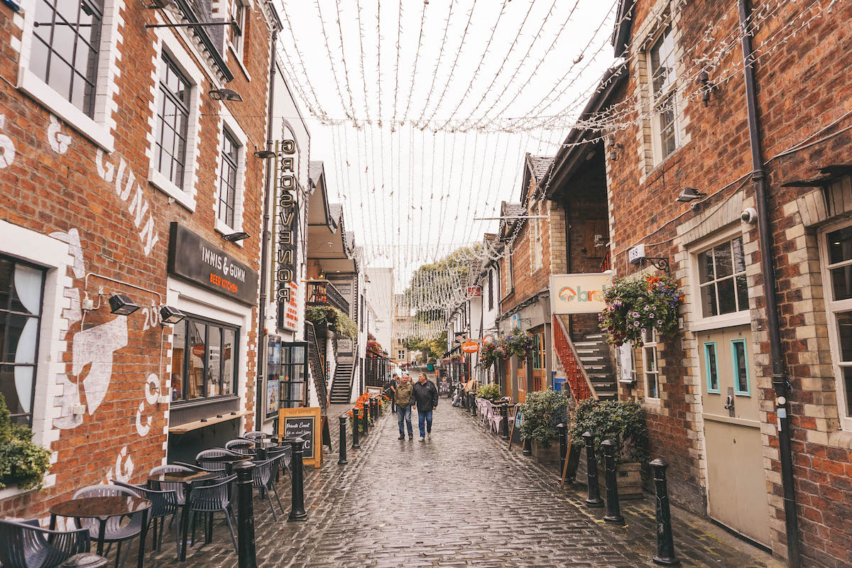 Ashton Lane, strung up with twinkle lights. 