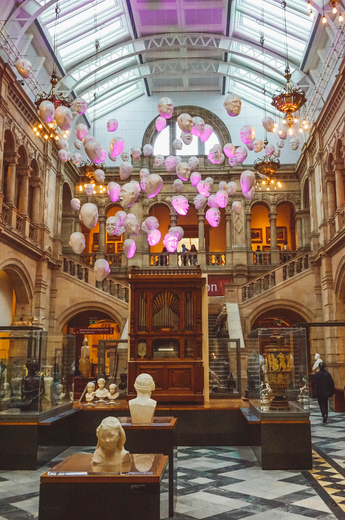 The floating heads inside the Kelvingrove Museum. 