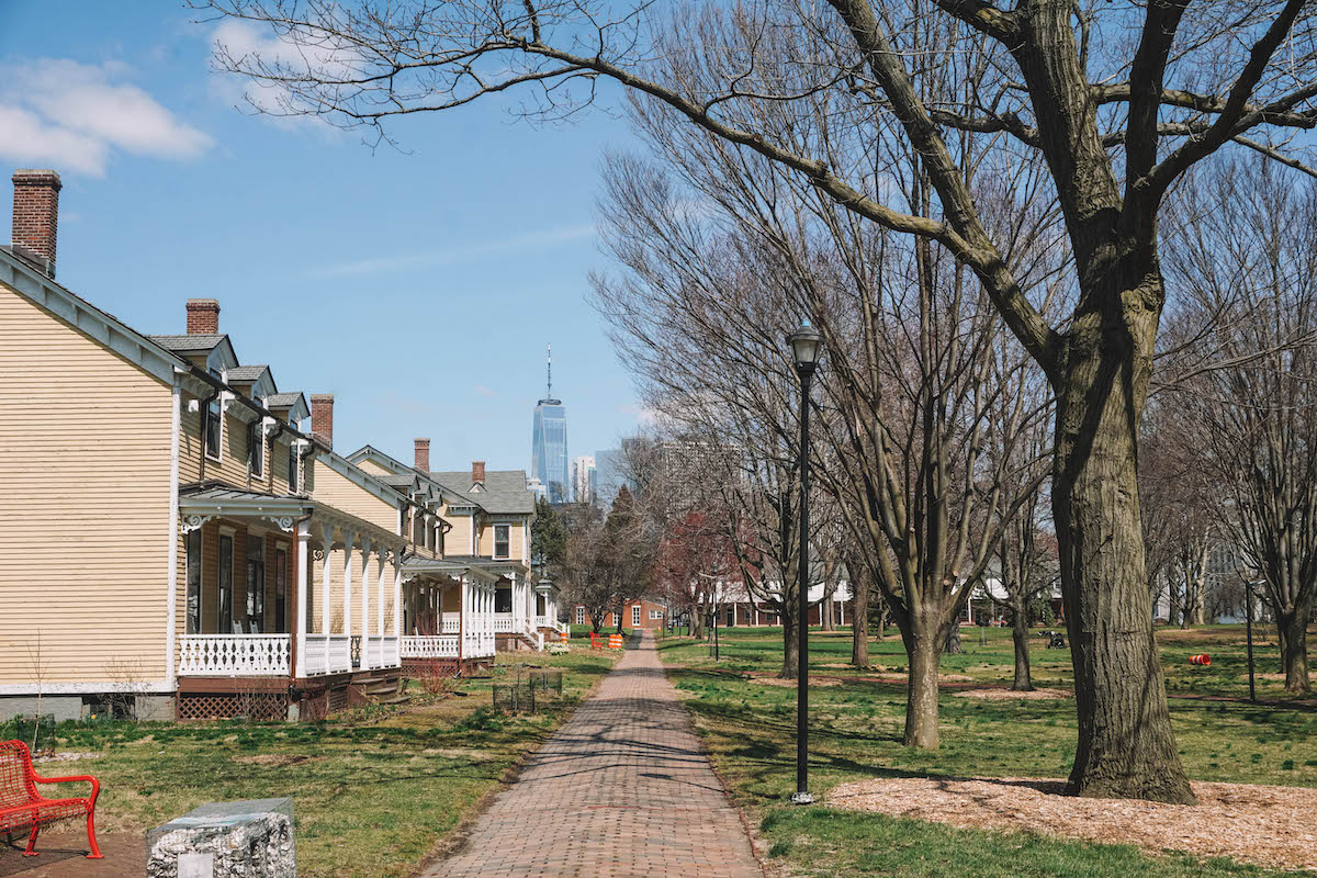 Nolan Park on Governors Island, with a view of the Manhattan skyline in the background. 