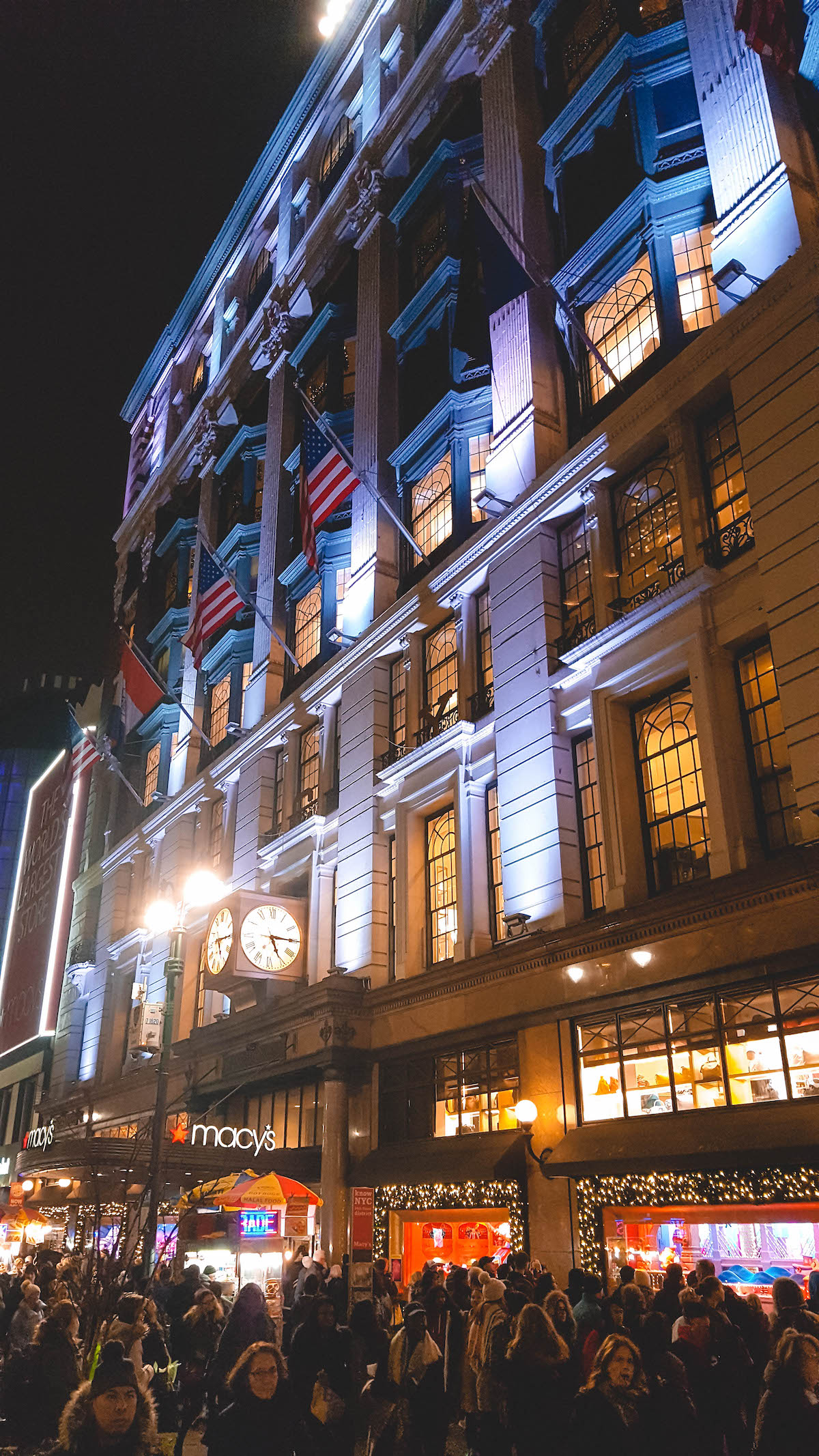 Facade of the Macy's flagship store in NYC, seen at night. 