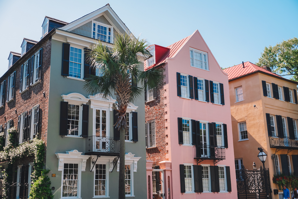 Close up view of pastel homes along Rainbow Row in Charleston.