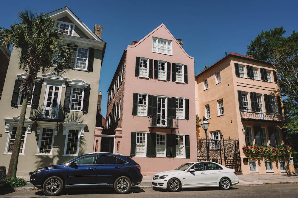 Three pastel row houses in Charleston, SC. 