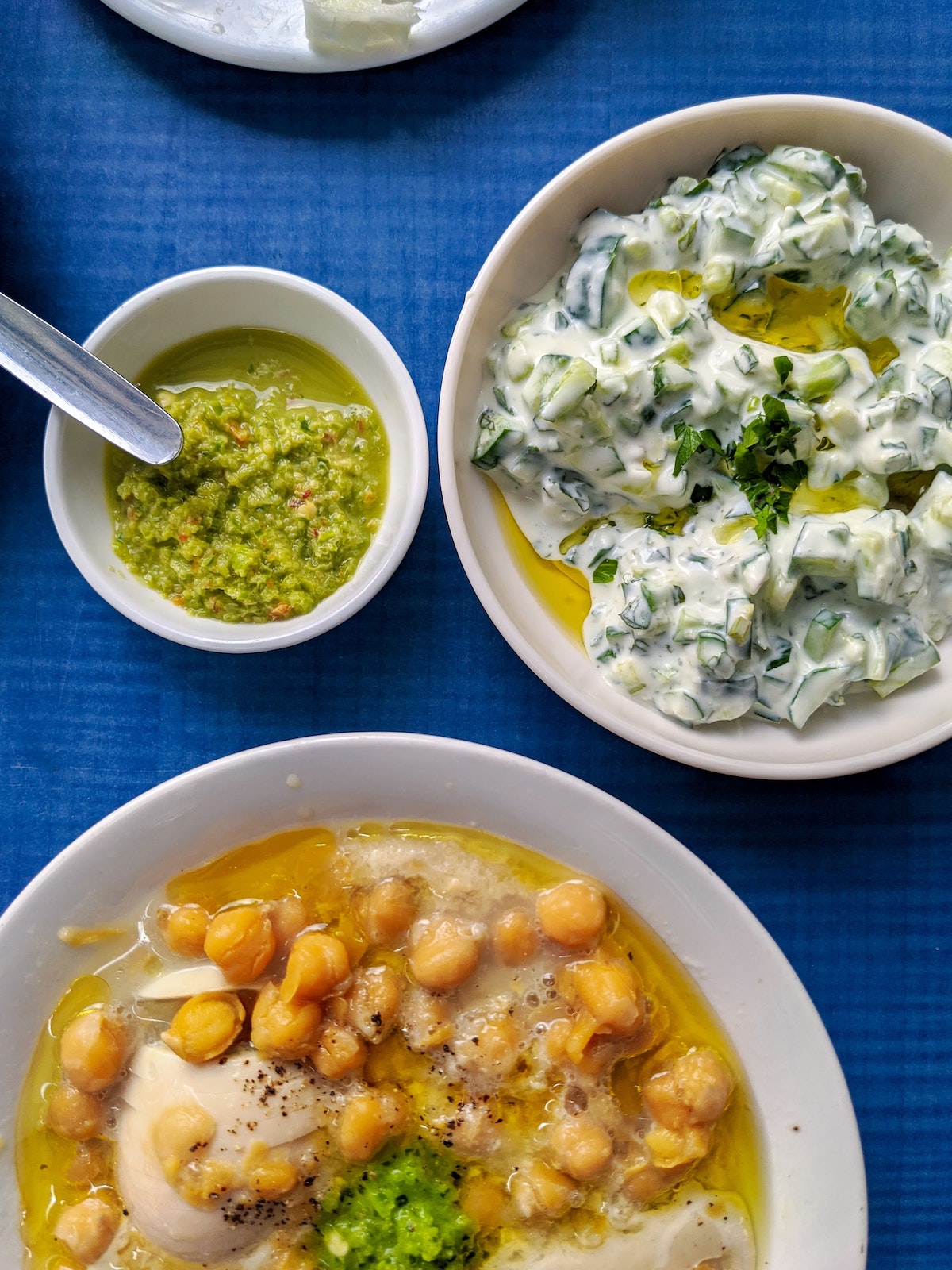 Bowls containing various Greek dips. 