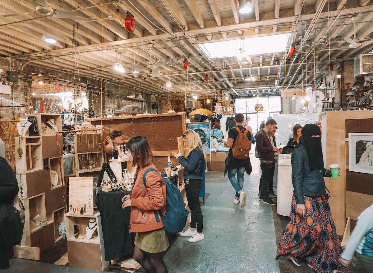 Stalls set up inside for Artists and Fleas in Brooklyn, NYC.