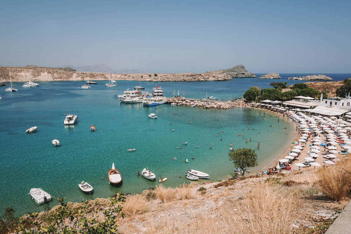 A beach in Rhodes, Greece on a sunny day.