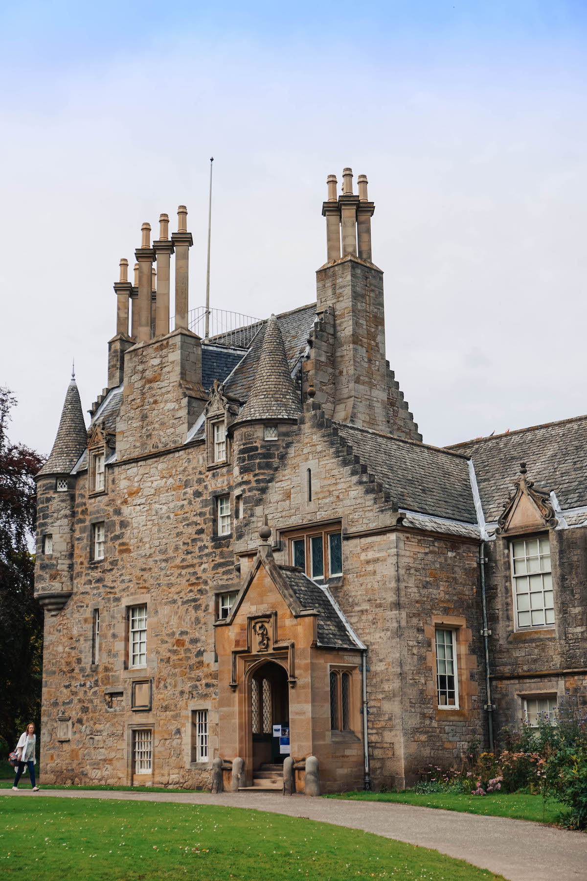 The front of Lauriston Castle, with a blue sky overhead. 