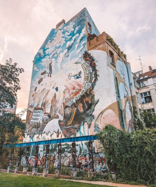 A mural covering the side of a building in Berlin