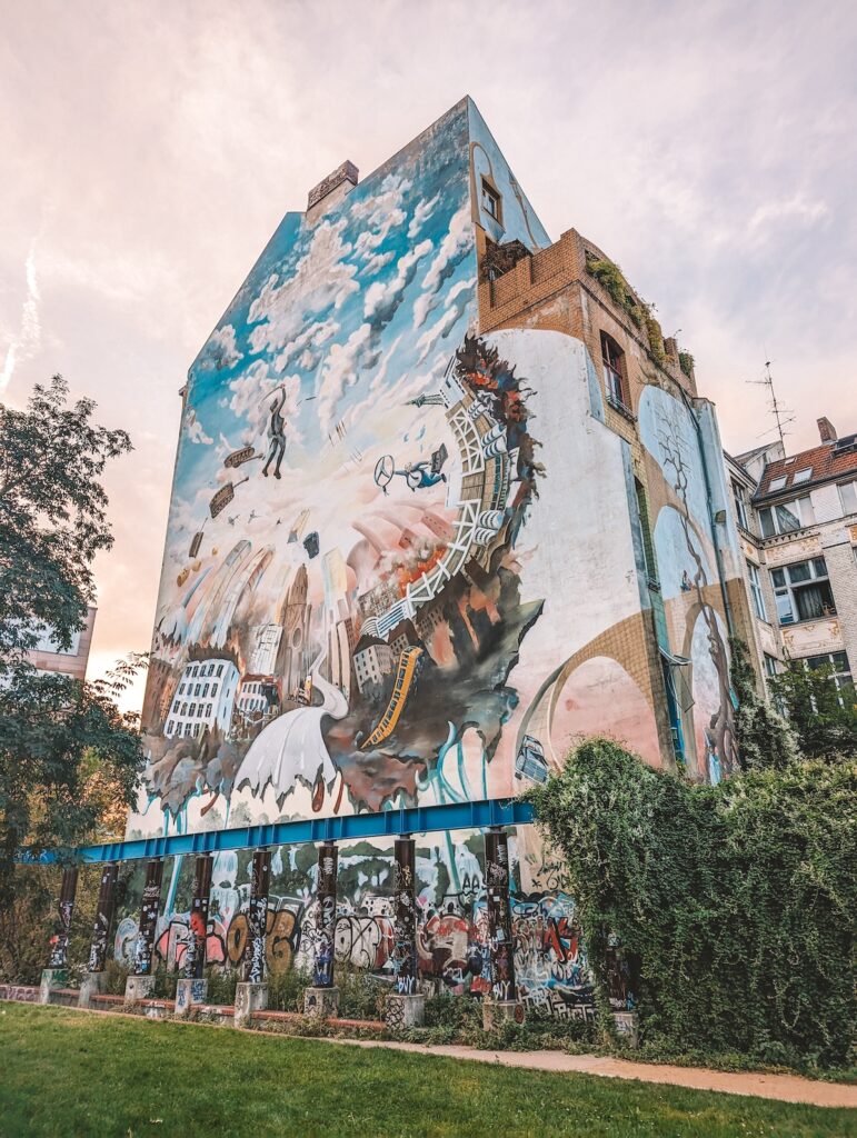 A mural covering the side of a building in Berlin