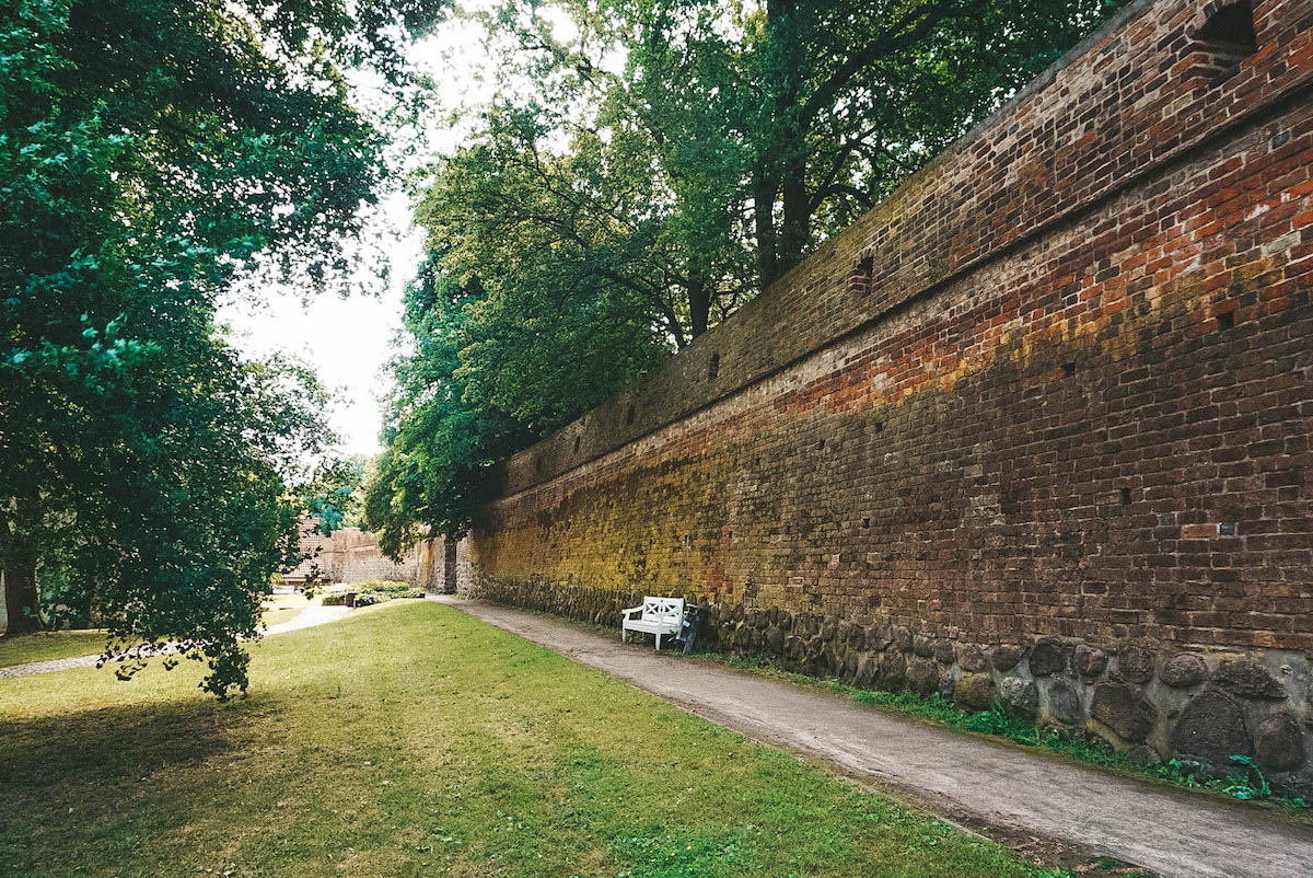 The remains of Rostock's city wall, with a bench. 
