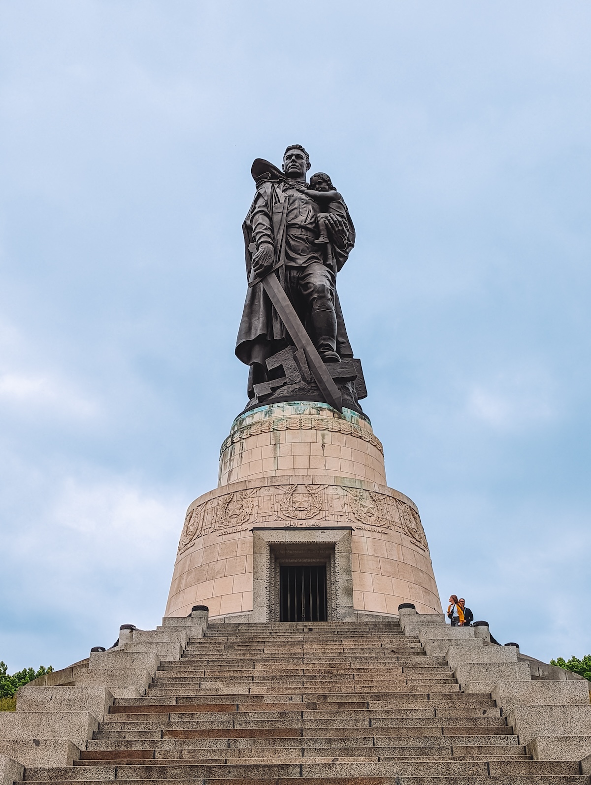 Large statue of Soviet soldier at Soviet War Memorial in Berlin