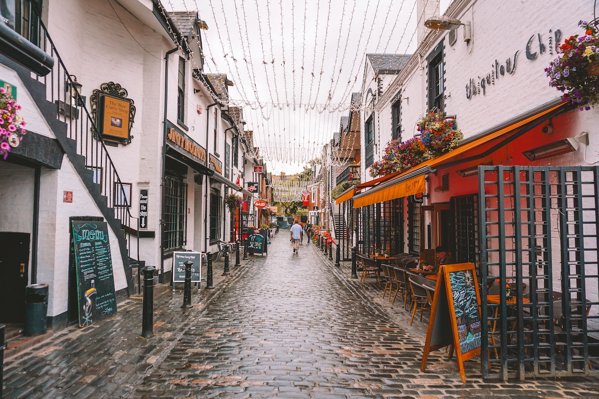 Street bedecked with string lights in Glasgow, Scotland. 