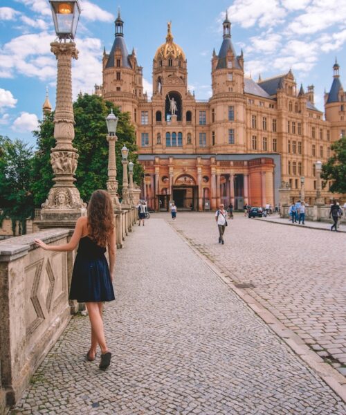 Woman standing in front of Schwerin Castle.