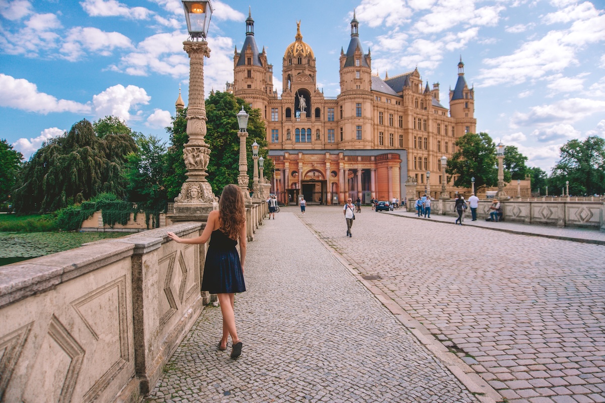 Woman standing in front of Schwerin Castle.