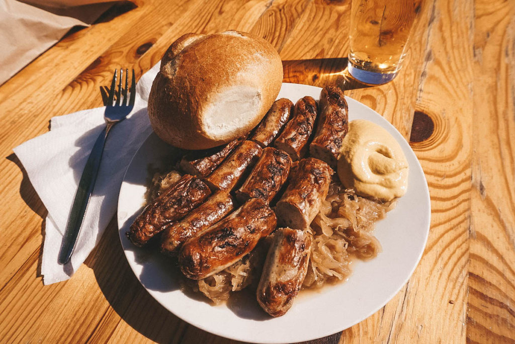 A plate of sausages and sauerkraut at the Viktualienmarkt in Munich. 