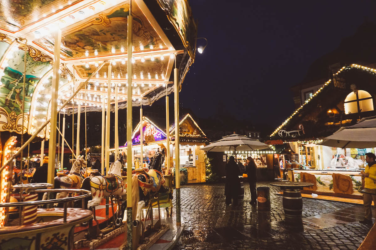 A carousel at the Heidelberg Christmas Market, lit up at night