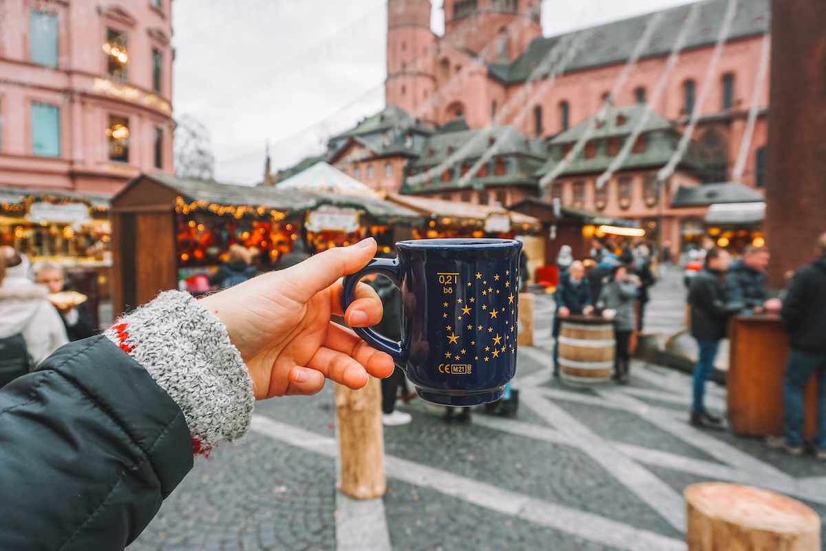 Mug held aloft at the Mainz Christmas market