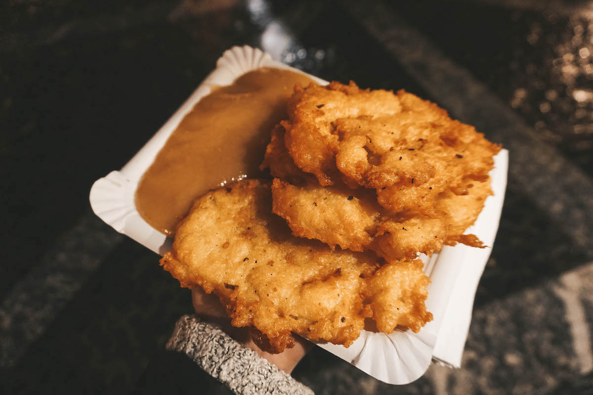 Three potato pancakes wit applesauce.