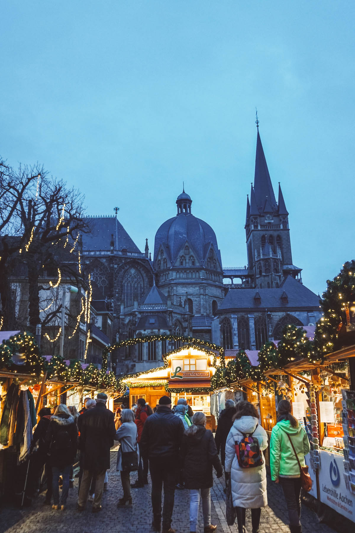 Aachen cathedral with Christmas market in foreground