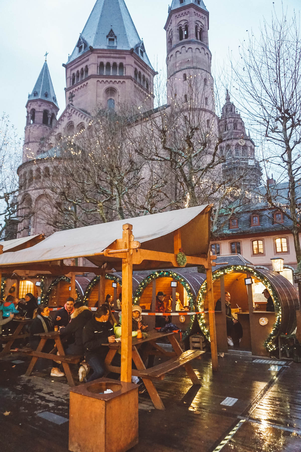 Large barrels with tables in them, beneath Mainz cathedral