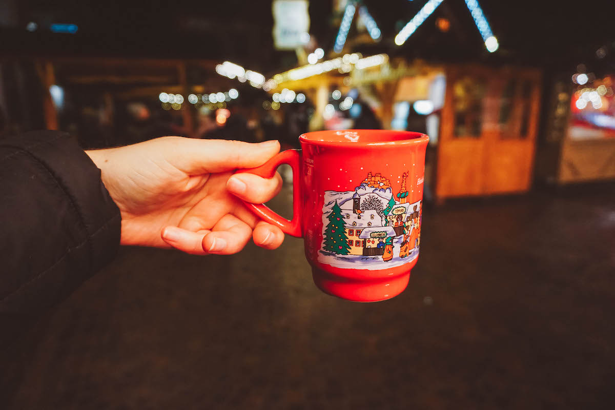 Heidelberg Christmas market mug being held aloft