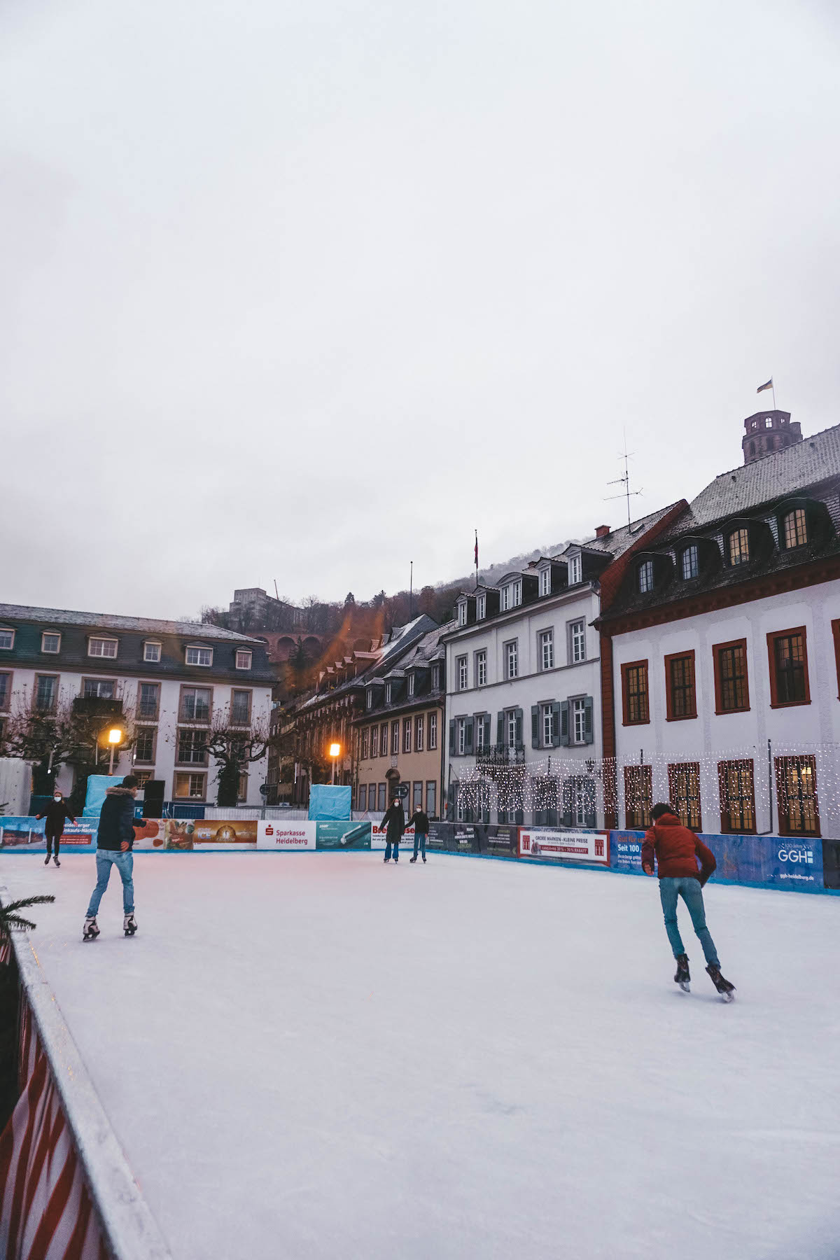 The ice skating rink at Karlsplatz in Heidelberg, during Christmas market season. 