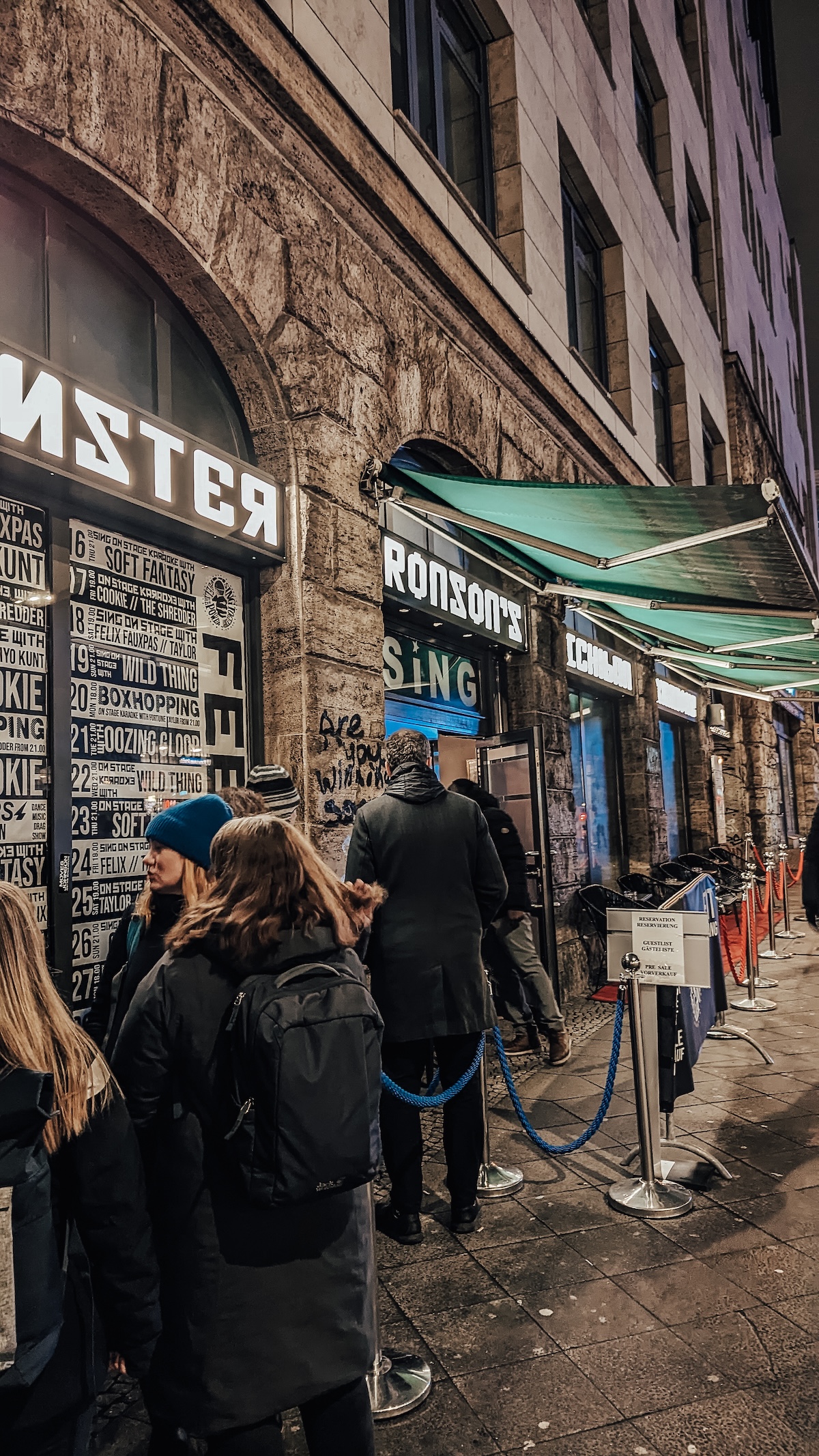 Line of people waiting outside of Monster Ronson's in Berlin.