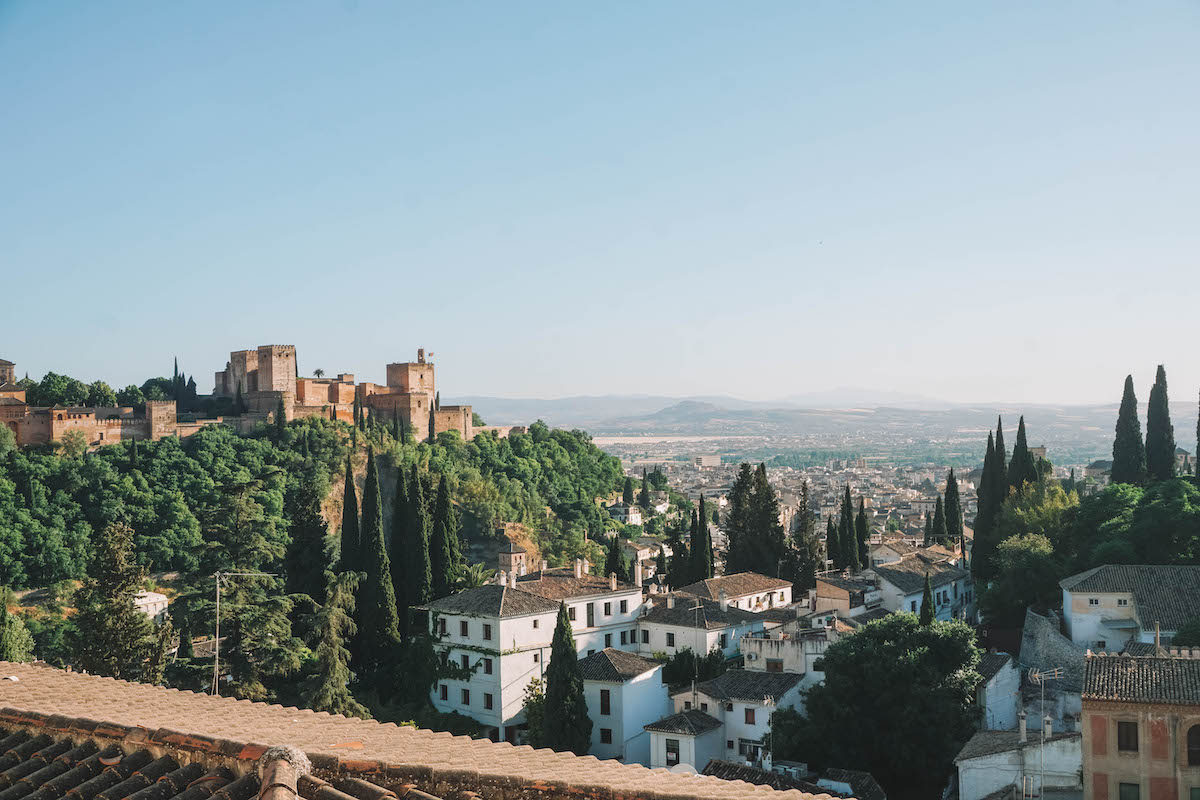 A scenic view of Albaicin and the Alhambra in Granada at sunset 