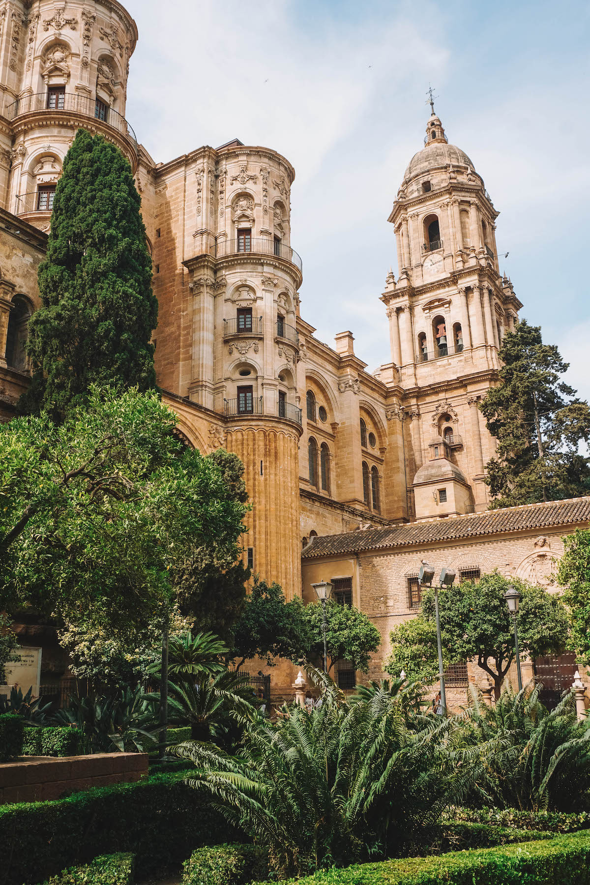 The bell tower of La Manquita of Malaga, seen from the gardens.