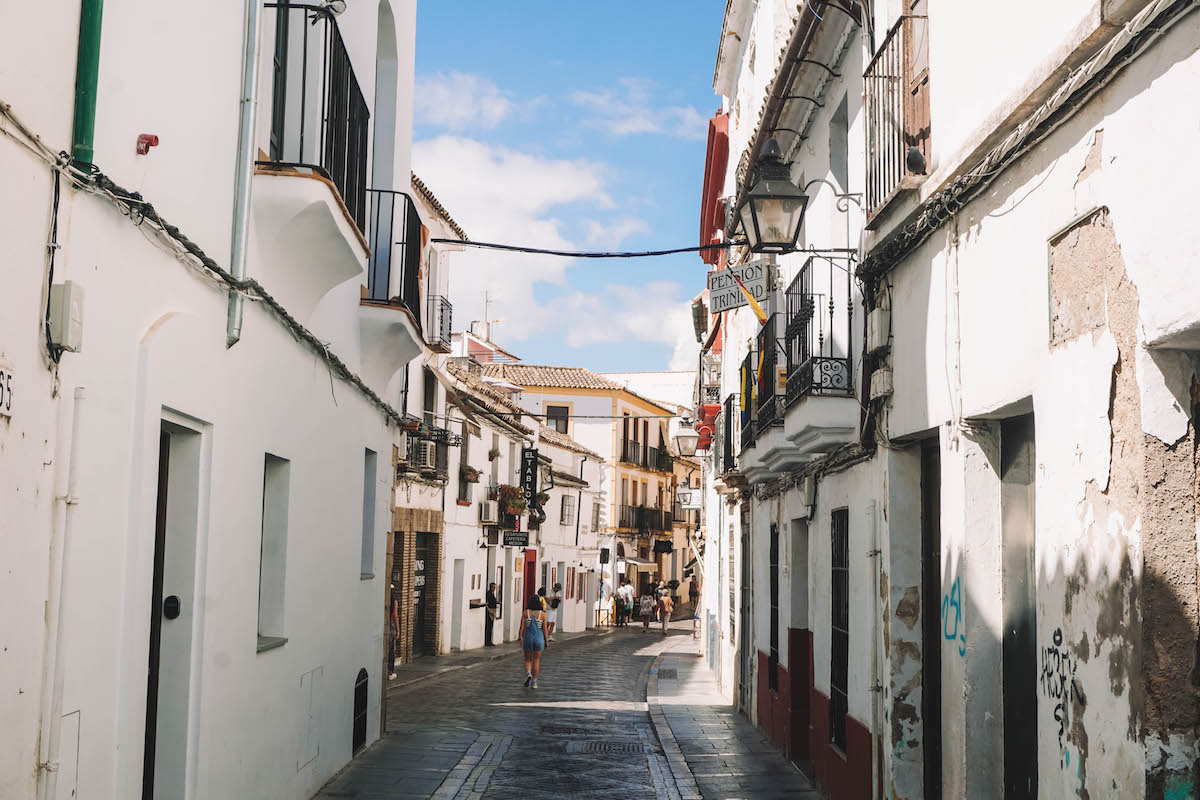 A street in Old Town Cordoba, lined with white washed houses. 