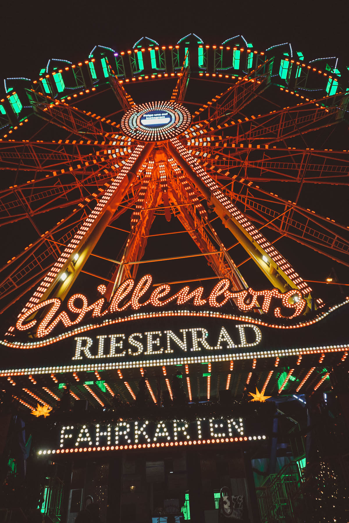 Ferris wheel at night, lit up