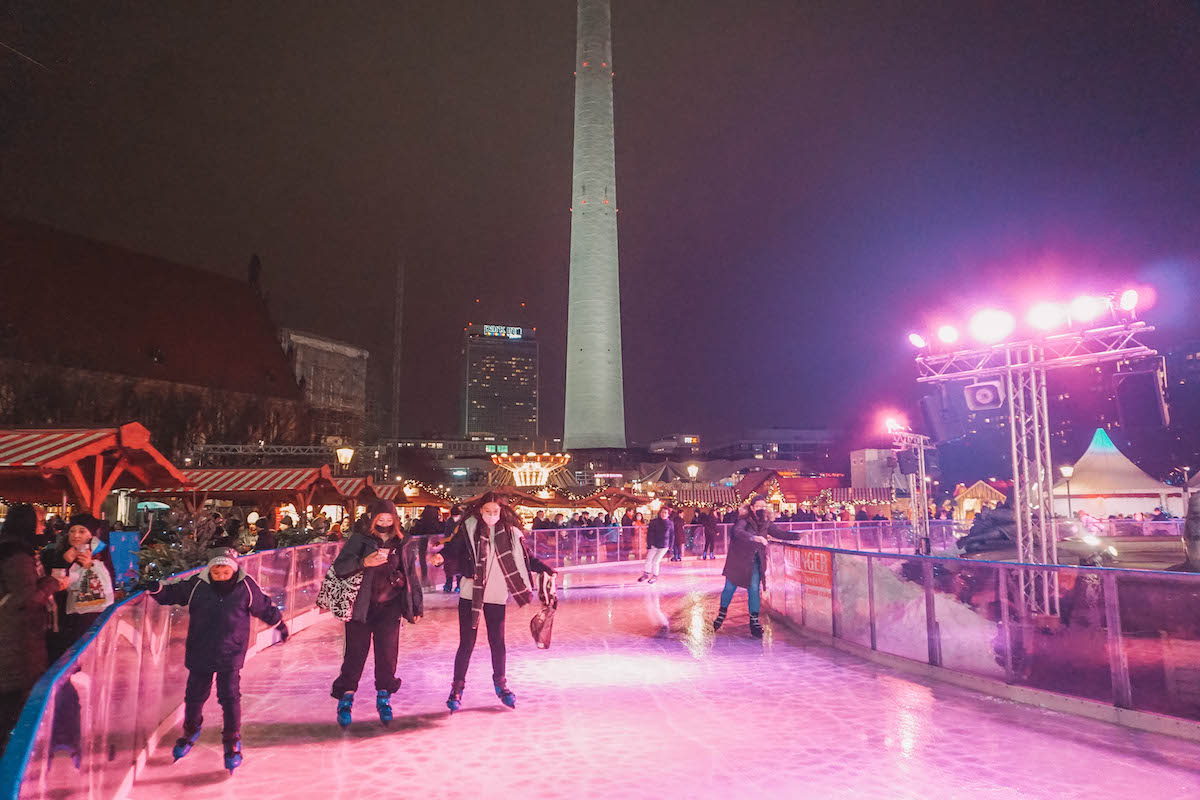 An ice rink lit up at night in Berlin 