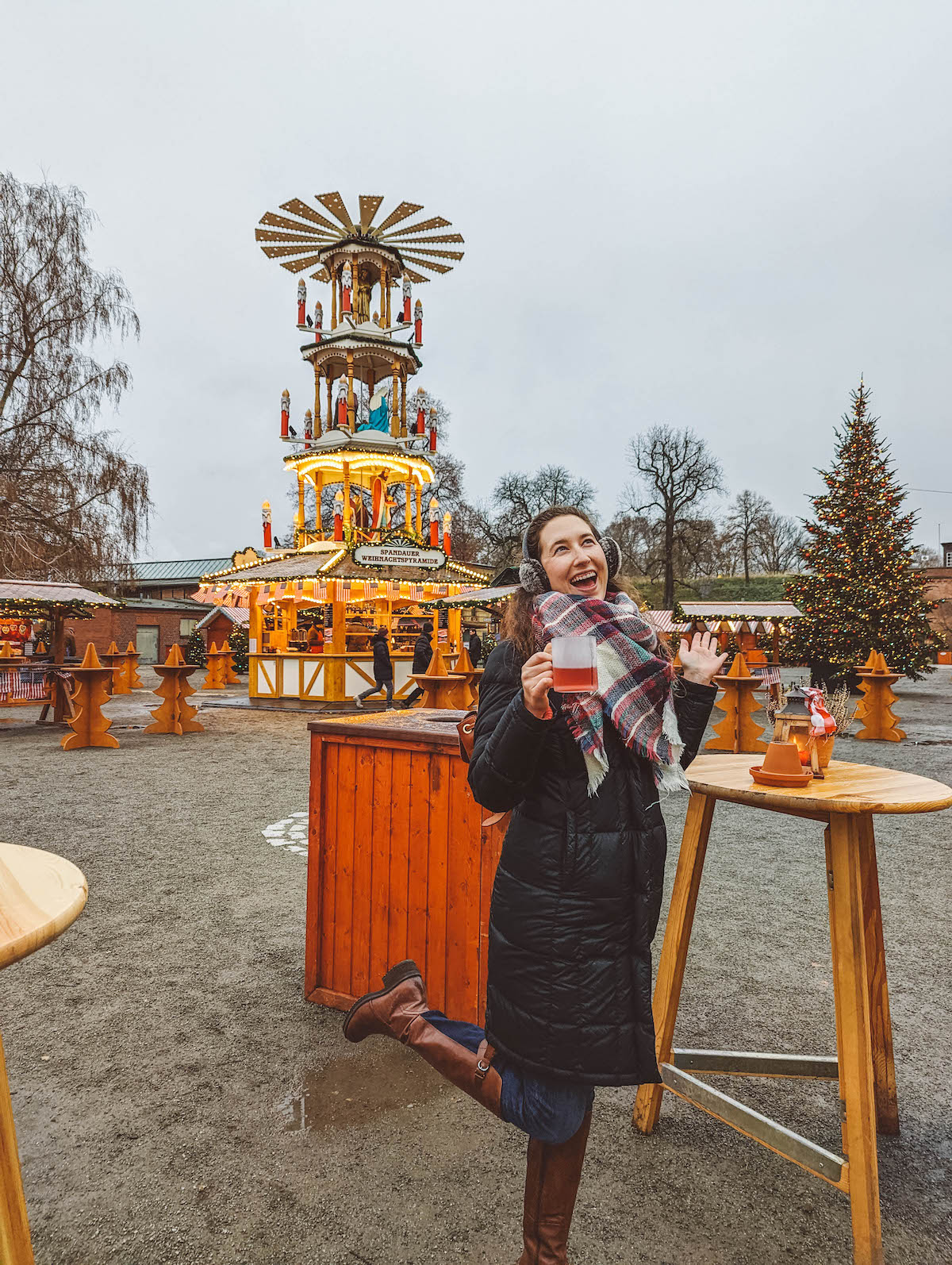 A woman being goofy at the Spandau Citadel Christmas market. 