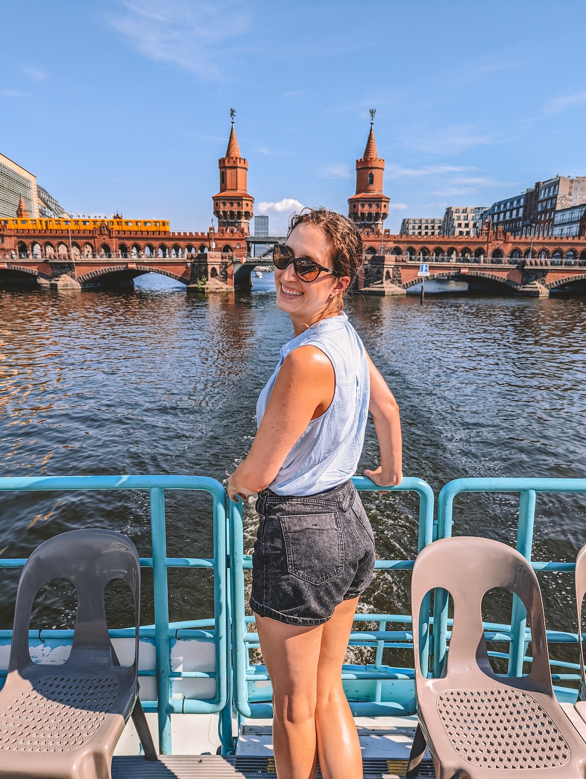 Woman smiling on Spree river boat cruise. 