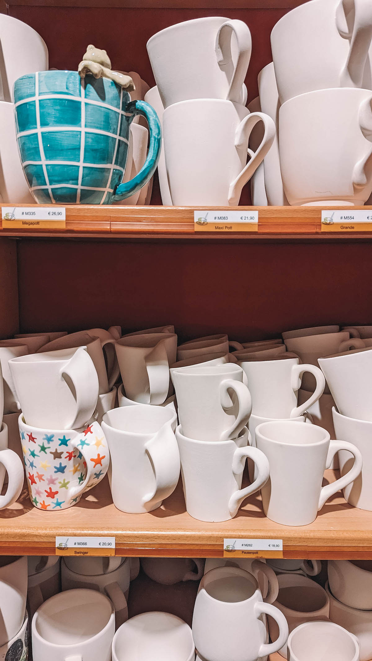 Unpainted mugs at Paint Your Style in Charlottenburg, Berlin. 