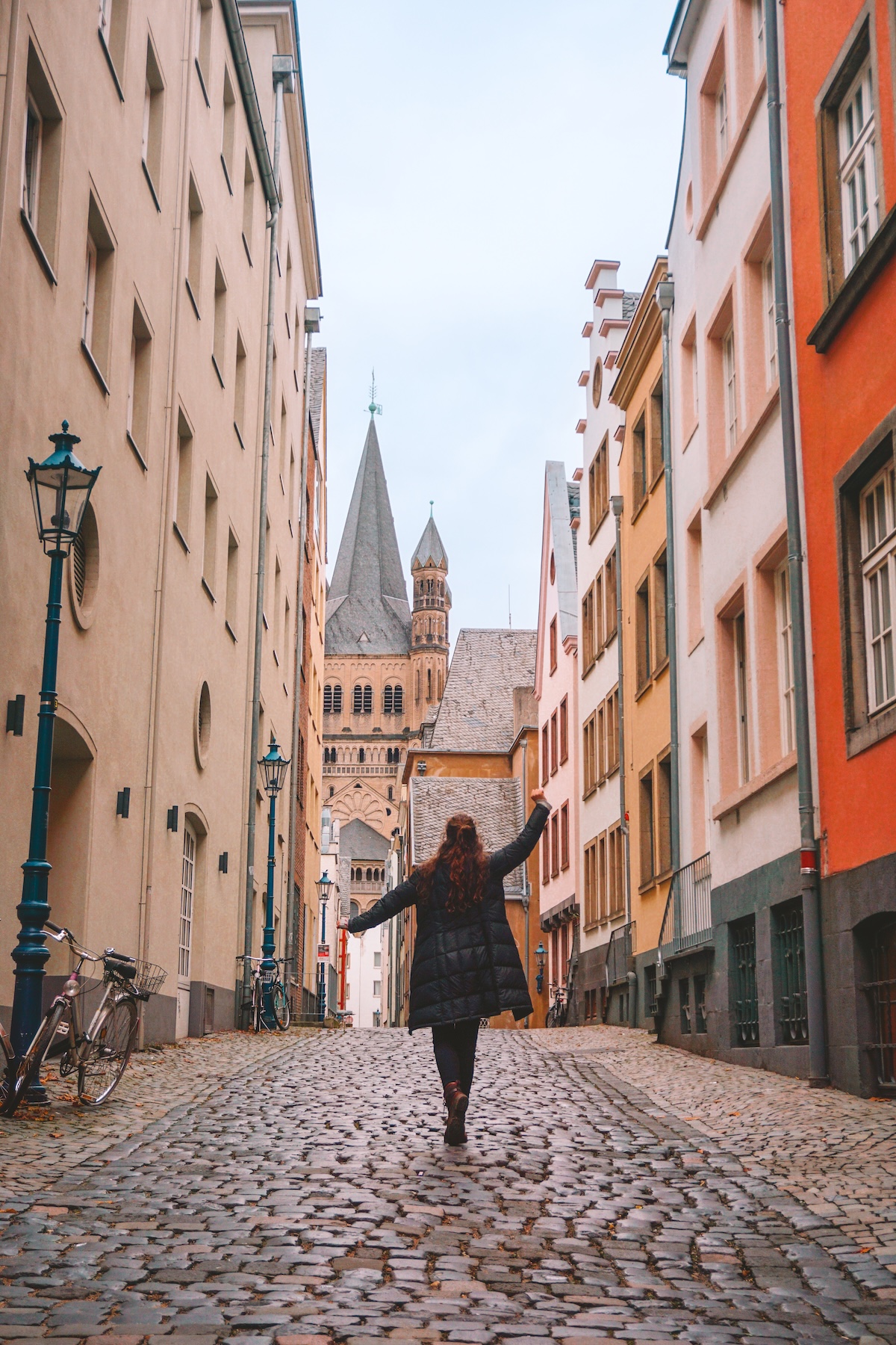 Woman walking down street in Cologne