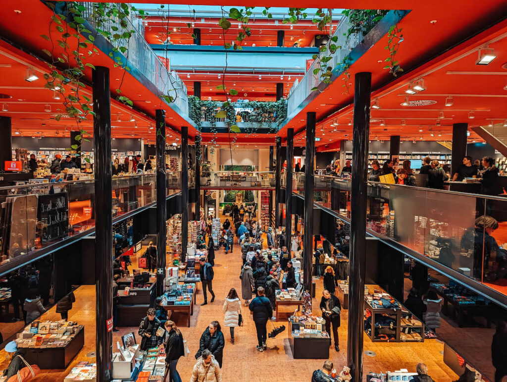 Inside the Dussman bookstore in Berlin, seen from an upper level 