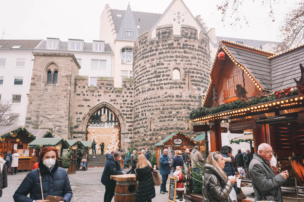 The Sterntor gate at Bottlerplatz in Bonn, with Christmas market stalls in front of it