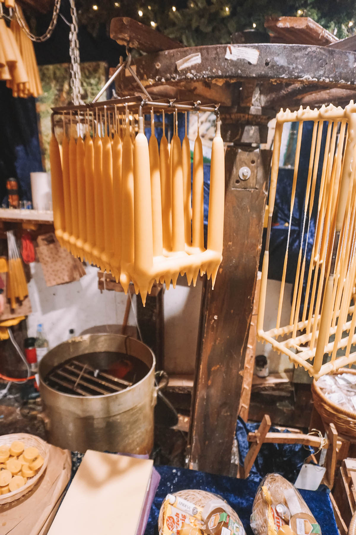 Beeswax candles in the making at Bonn's Christmas market