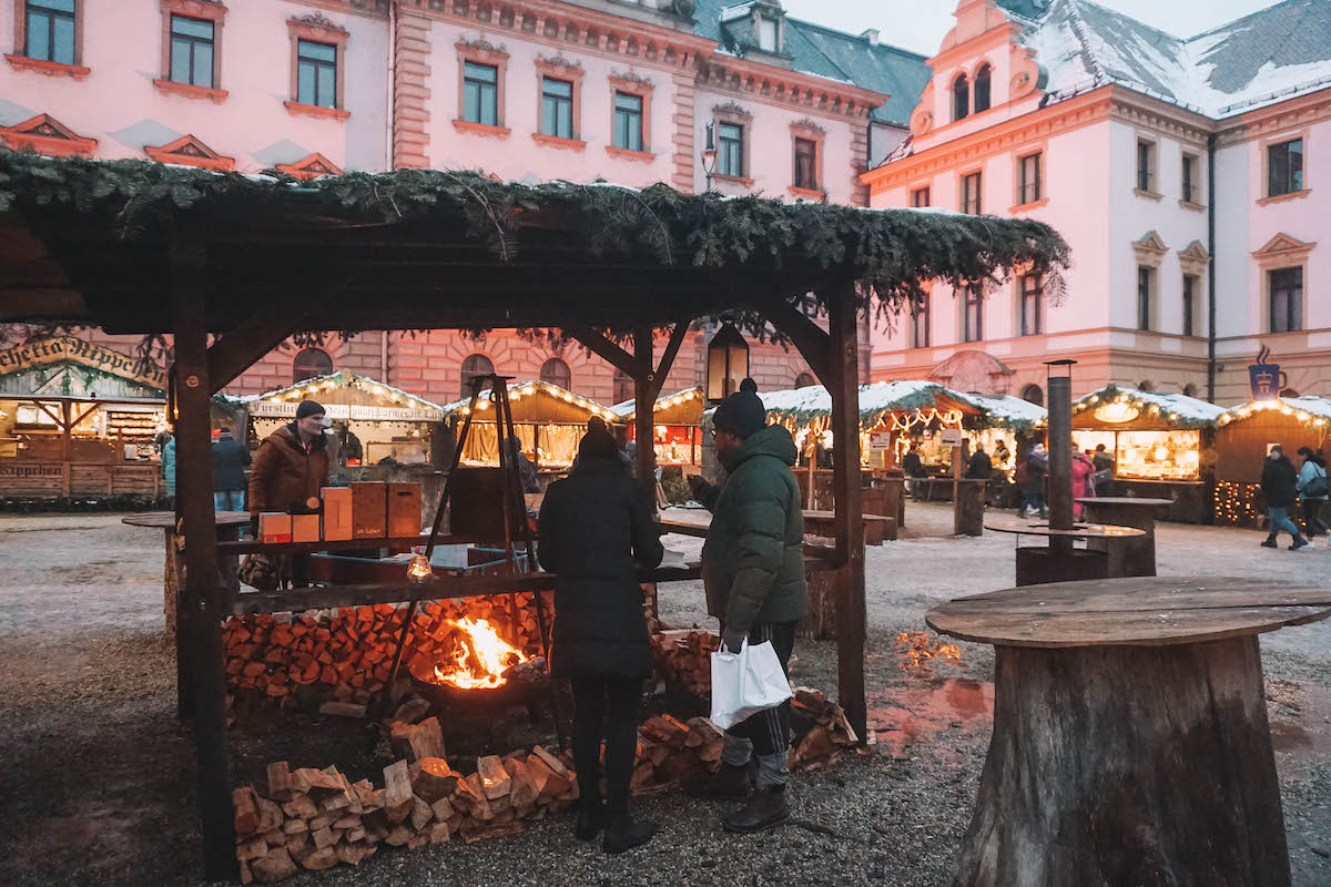 A fire pit at the Schloss Thurn und Taxis Christmas market in Regensburg, Germany