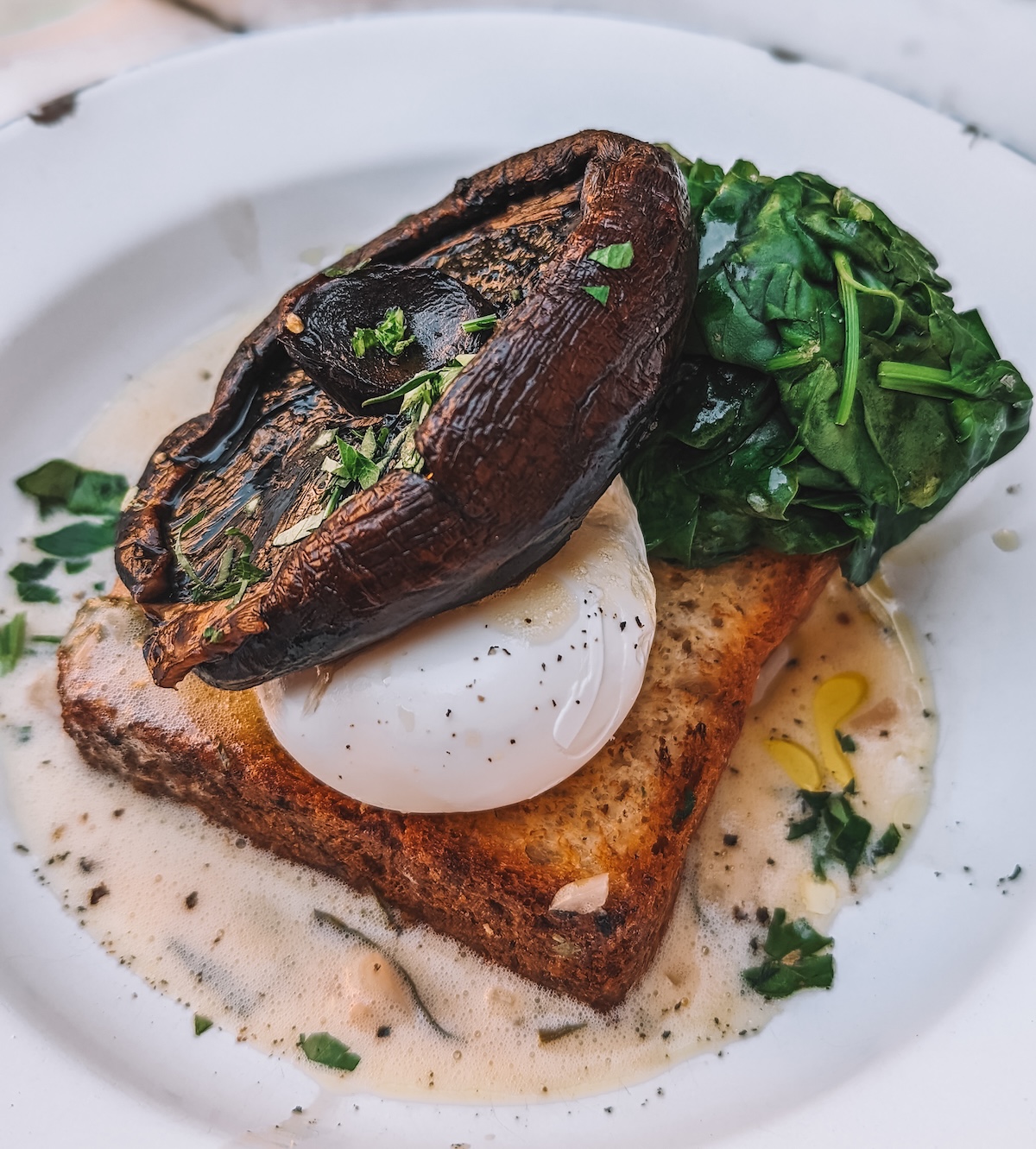 Vegetarian eggs benedict with mushroom on top