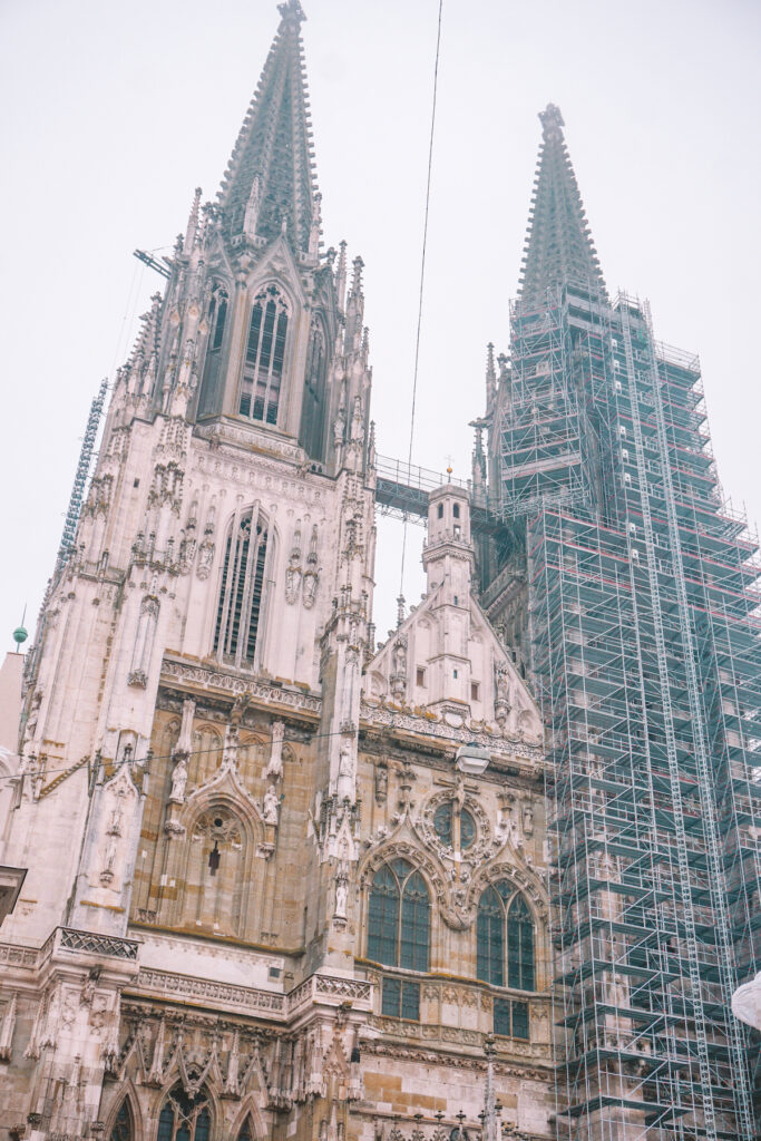 The Regensburger Dom, partially covered in scaffolding.