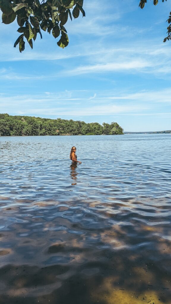 Woman smiling in Wannsee in Berlin