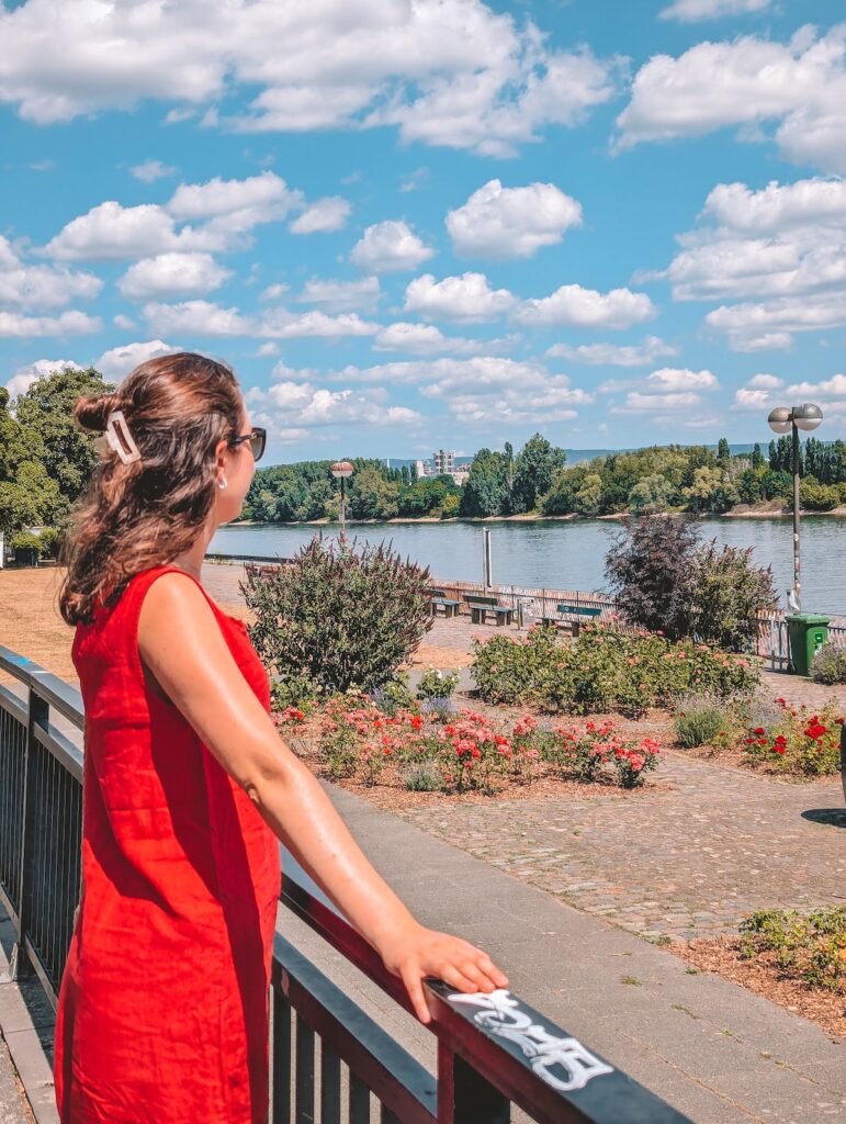 Woman looking at the Rhine River in Mainz.