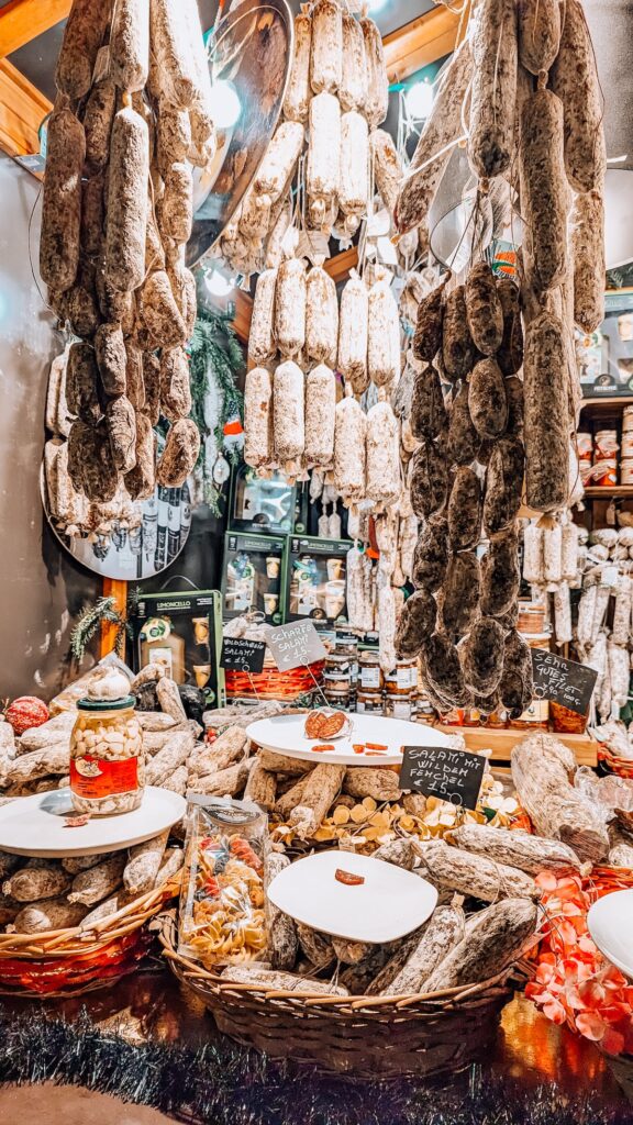 Cured meats for sale at Christmas market