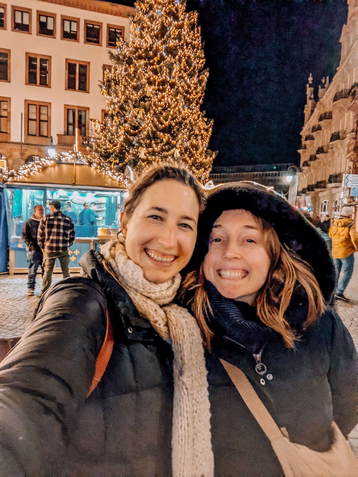 Two women smiling at the Wiesbaden Christmas market