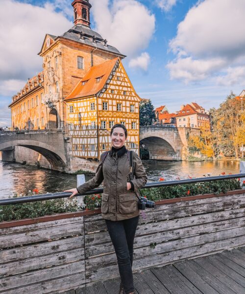 Woman smiling in front of Old Town Hall in Bamberg