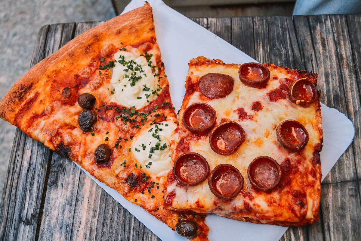 Two slices of Magic John's pizza